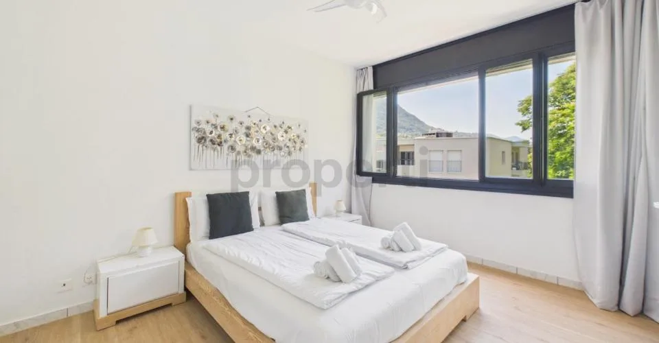 Lugano : élégant appartement 3.5 pièces avec deux balcons et deux places de parking dans une résidence soignée – photo 19 sur 25