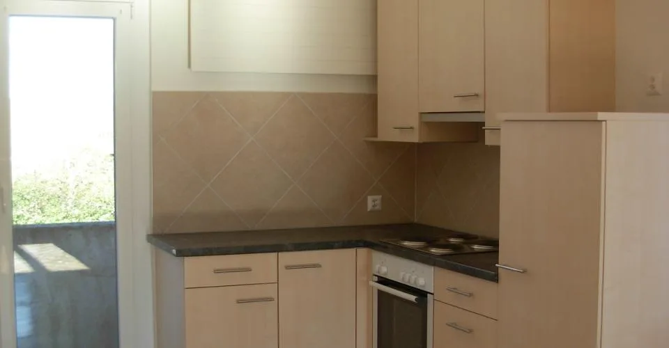 Appartement 4 pièces avec balcons et garage à Val-de-Ruz