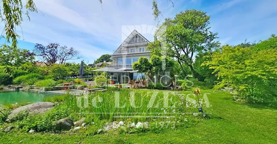 Situation premium : Villa avec vue lac, piscine naturelle et vaste jardin intimiste – photo 9 sur 26
