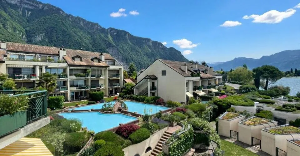 JOLI APPARTEMENT DE 4,5 PIECES AU BORD DU LAC AVEC TRES BELLE VUE PANORAMIQUE – photo 14 sur 24