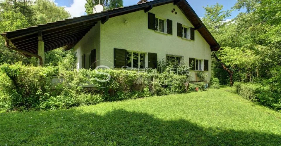Einfamilienhaus in einer grünen Umgebung – Foto 17 von 19