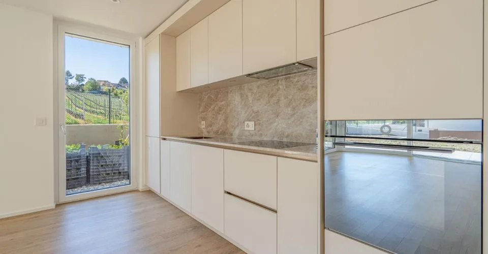 Rez-de-jardin de 3,5 pièces avec terrasse et jardin privatif – photo 4 sur 16