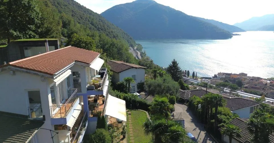 Affascinante casa indipendente da 4.5 locali con vista lago e potenziale di espansione a Bissone