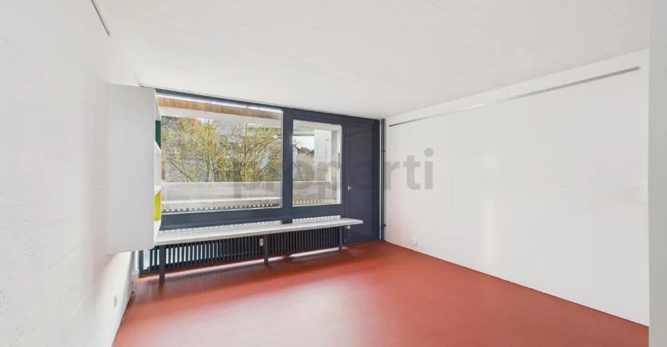 Wohnen in einer Ikone der Schweizer Architektur | Einzigartige Maisonettewohnung im denkmalgeschützten Atelier-5-Ensemble in Flamatt