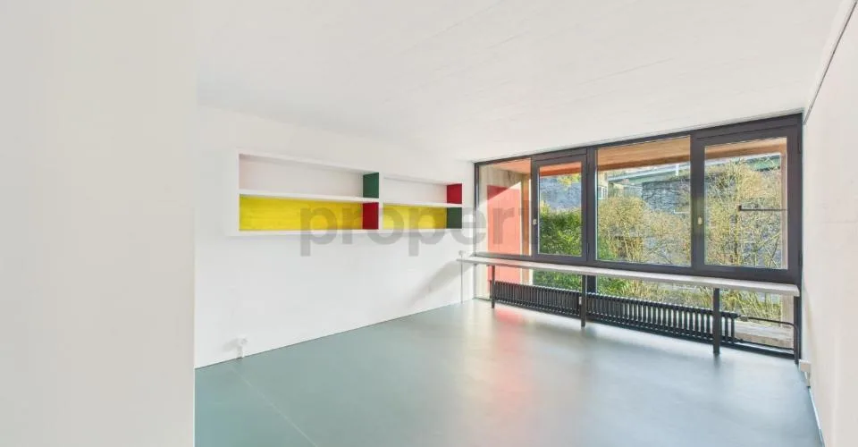 Wohnen in einer Ikone der Schweizer Architektur | Einzigartige Maisonettewohnung im denkmalgeschützten Atelier-5-Ensemble in Flamatt