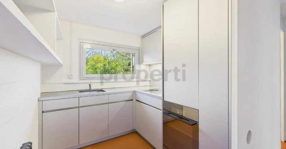 Wohnen in einer Ikone der Schweizer Architektur | Einzigartige Maisonettewohnung im denkmalgeschützten Atelier-5-Ensemble in Flamatt