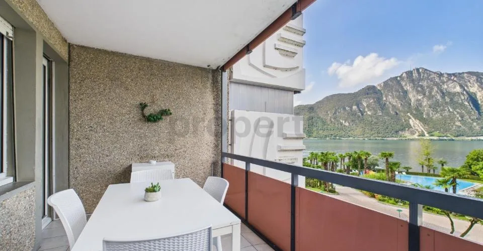 Appartement de 2,5 pièces avec vue sur le lac et piscine en copropriété  idéal comme résidence principale, secondaire ou investissement pour locations de courte durée ! – photo 18 sur 20