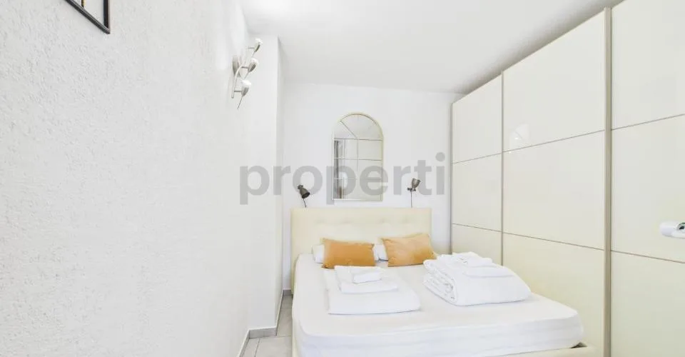 Appartement de 2,5 pièces avec vue sur le lac et piscine en copropriété  idéal comme résidence principale, secondaire ou investissement pour locations de courte durée ! – photo 16 sur 20