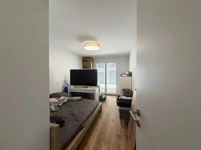 Bel appartement de 4.5 pièces au rez-de-chaussée avec jardin privatif