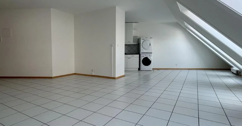 Au cour de la ville - Appartement mansardé de 4.5 pièces