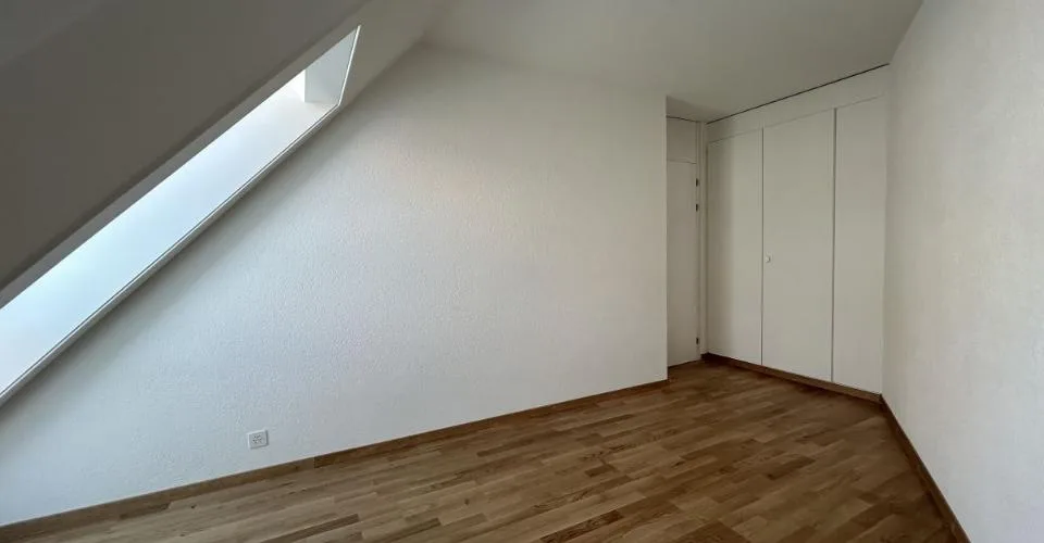 Au cour de la ville - Appartement mansardé de 4.5 pièces