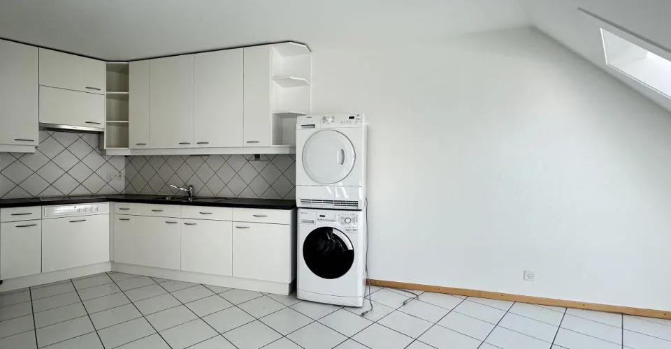 Au cour de la ville - Appartement mansardé de 4.5 pièces