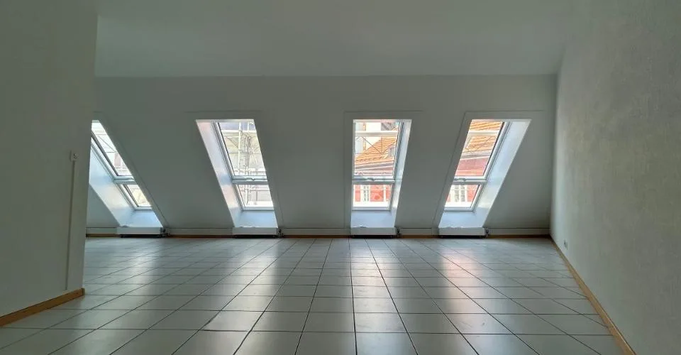 Au cour de la ville - Appartement mansardé de 4.5 pièces