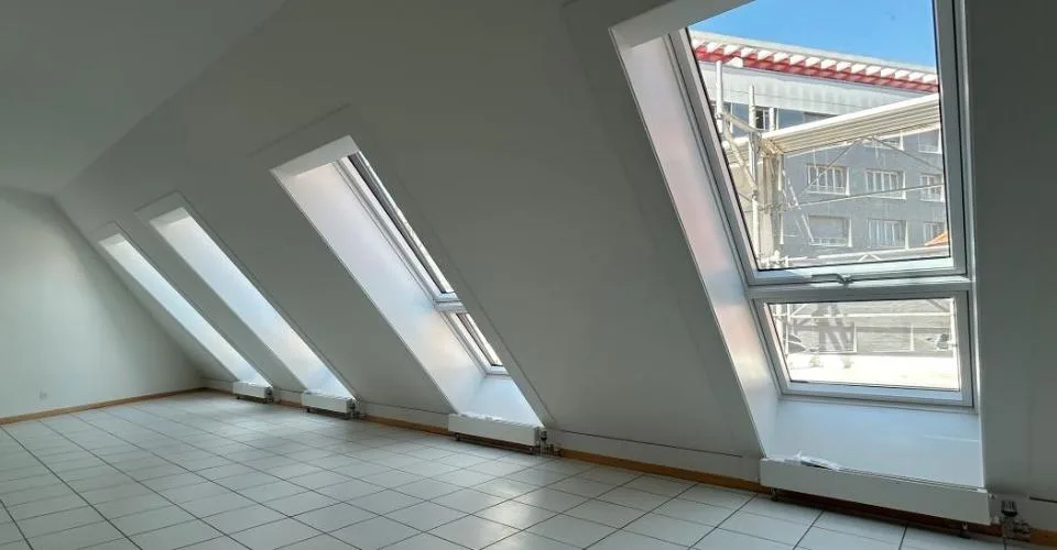Au cour de la ville - Appartement mansardé de 4.5 pièces
