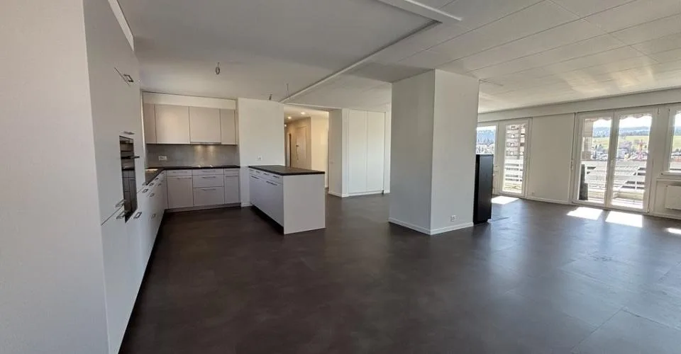 Spacieux appartement en attique avec deux balcons