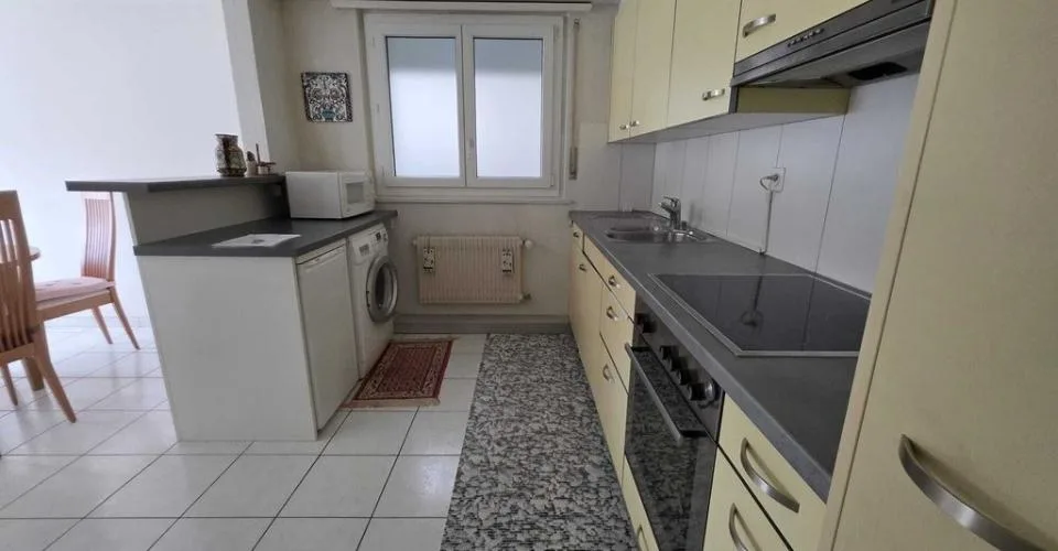 Appartement de 4 pièces au 1er étage avec ascenseur