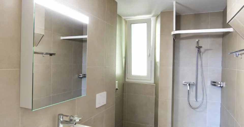 Magnifique appartement de 4 pièces à Neuchâtel, avec grande terrasse, jardin commun et coin potager