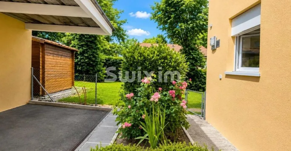 Maison familiale avec jardin, véranda, box et place couverte