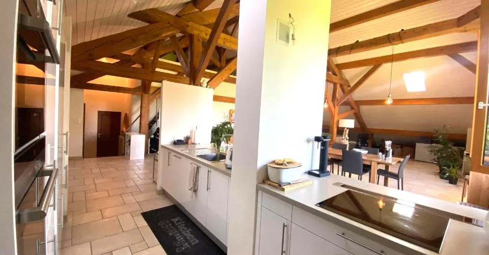 Charmant appartement de 6 pièces au dernier étage d'une ferme rénovée