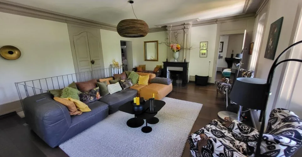DUPLEX EN REZ-DE-JARDIN DE 7 PIECES
