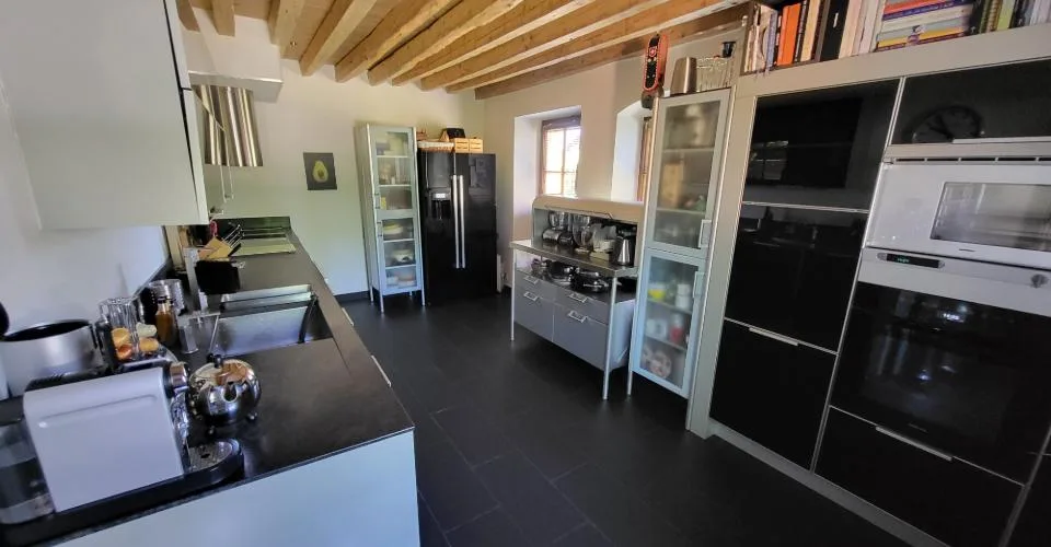DUPLEX EN REZ-DE-JARDIN DE 7 PIECES