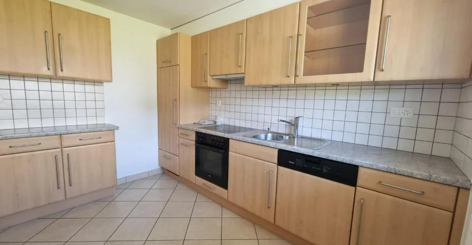 Maison en rangÃ©e de 4 piÃ¨ces en duplex avec petit espace vert