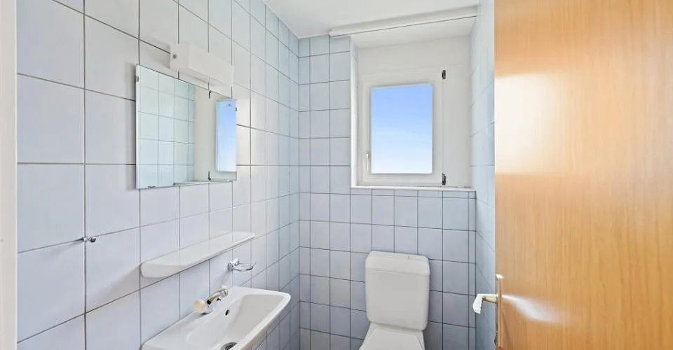 Appartement de 4 piÃ¨ces au rez-de-chaussÃ©e avec balcon