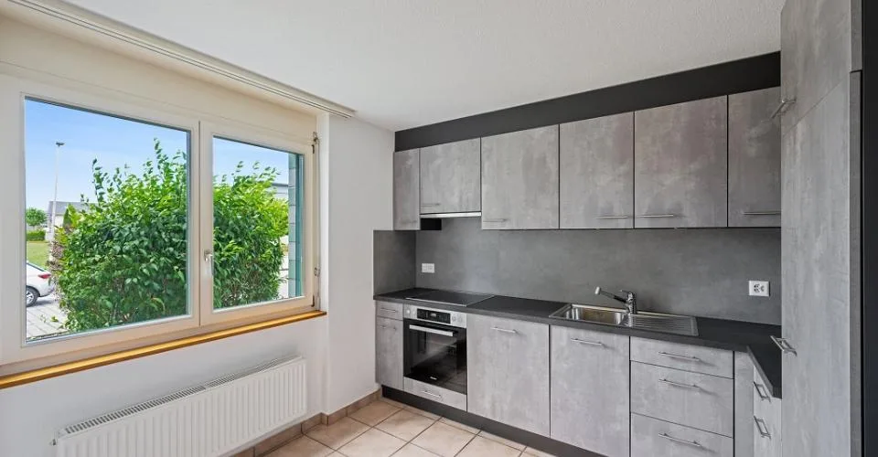 Appartement de 4 piÃ¨ces au rez-de-chaussÃ©e avec balcon