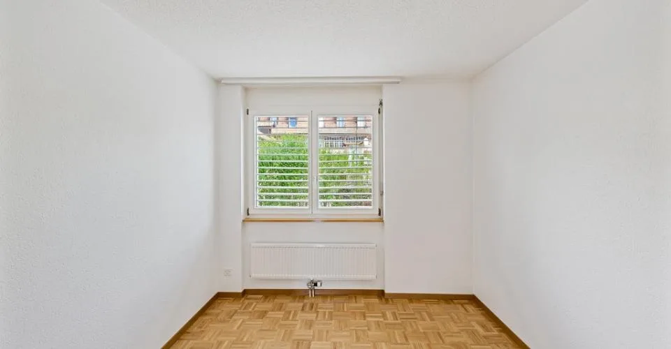 Appartement de 4 piÃ¨ces au rez-de-chaussÃ©e avec balcon