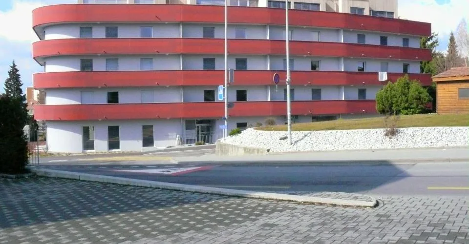 Place de parc à Düdingen – à 5 minutes de la gare