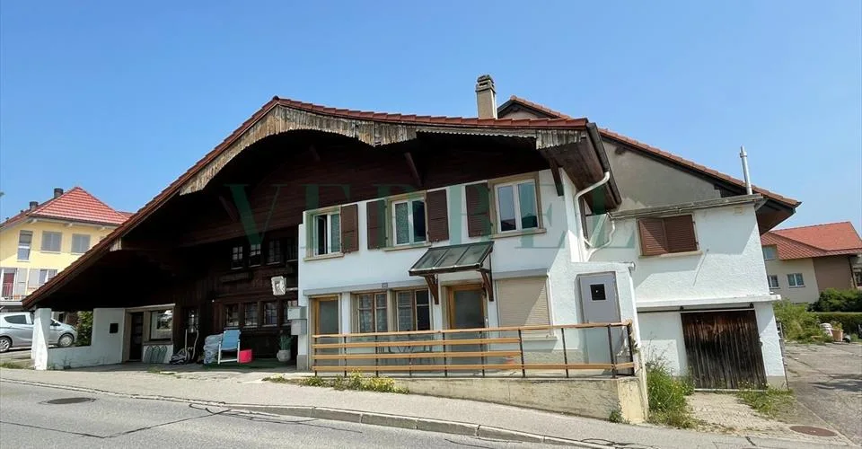 Grande maison avec potentiel d'aménagement