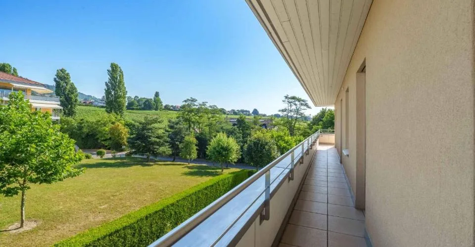 Duplex de standing de 7.5 pièces offrant une vue sur le Léman et les Alpes