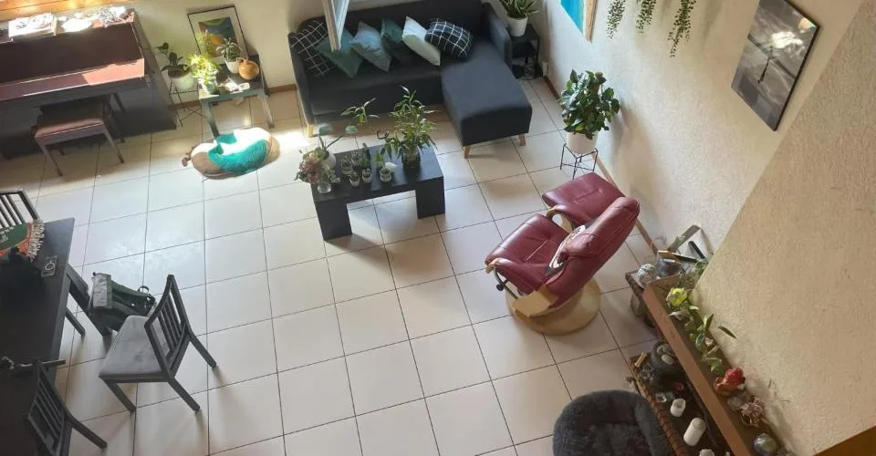 Duplex en attique au coeur de Bussigny dans un cadre verdoyant