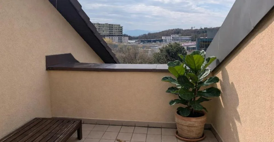 Duplex en attique au coeur de Bussigny dans un cadre verdoyant