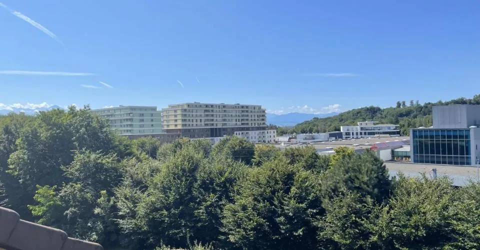 Duplex en attique au coeur de Bussigny dans un cadre verdoyant
