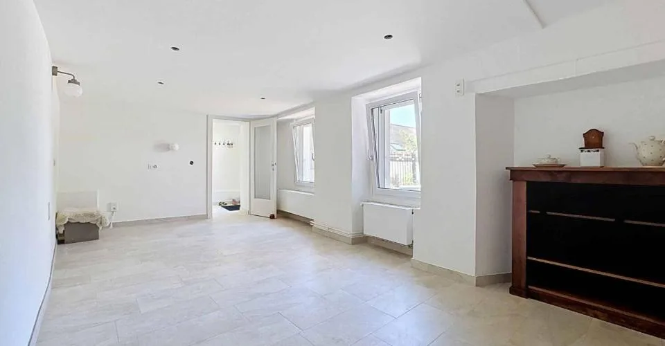 Maison mitoyenne de 7.5 pièces avec jardin et jardin d'hiver
