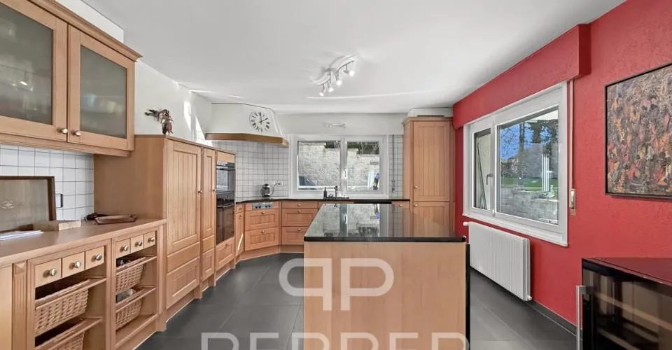 Écrin de verdure aux portes de Lausanne Spacieuse maison individuelle rénovée