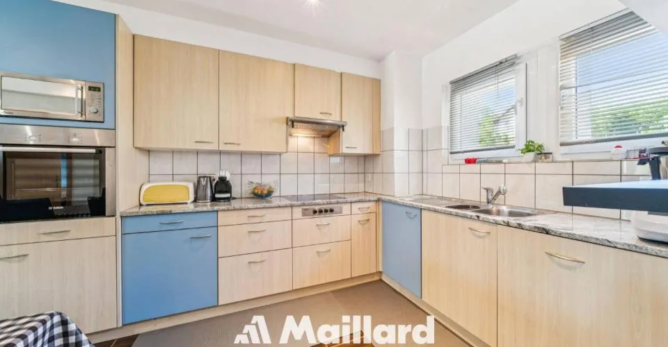 Propriété avec 2 appartements indépendants et atelier