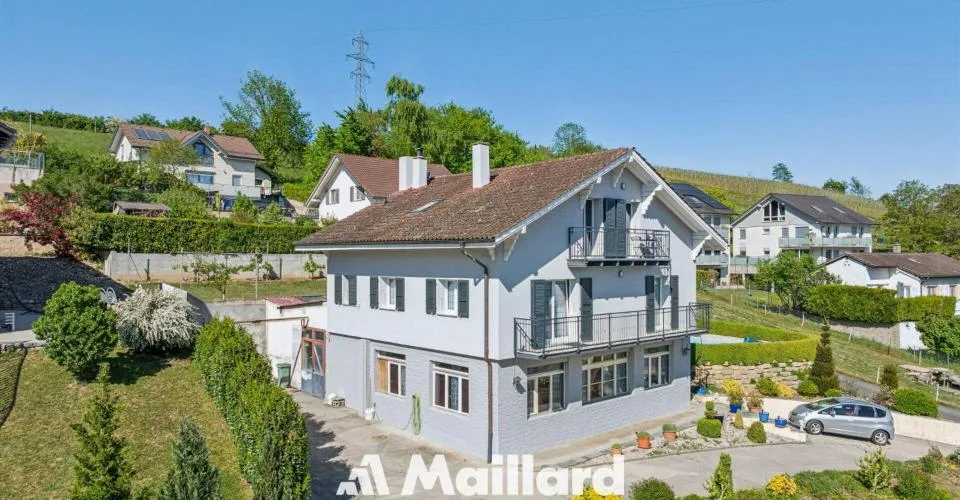 Propriété avec 2 appartements indépendants et atelier