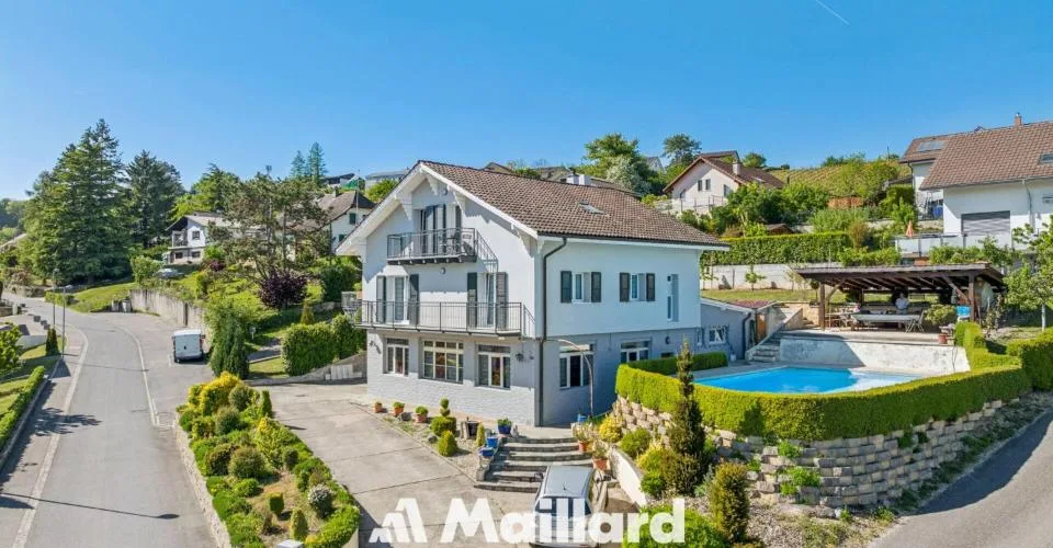 Propriété avec 2 appartements indépendants et atelier