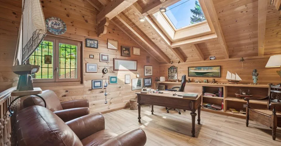 Un chalet d’exception de 6.5 p. avec vue imprenable sur le lac et la forêt, jardin, places de parc couvertes et garage box double