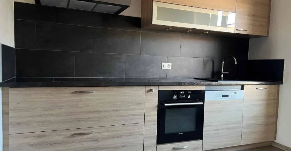 Immeuble locatif mitoyen à deux pas du centre-ville avec places de parc