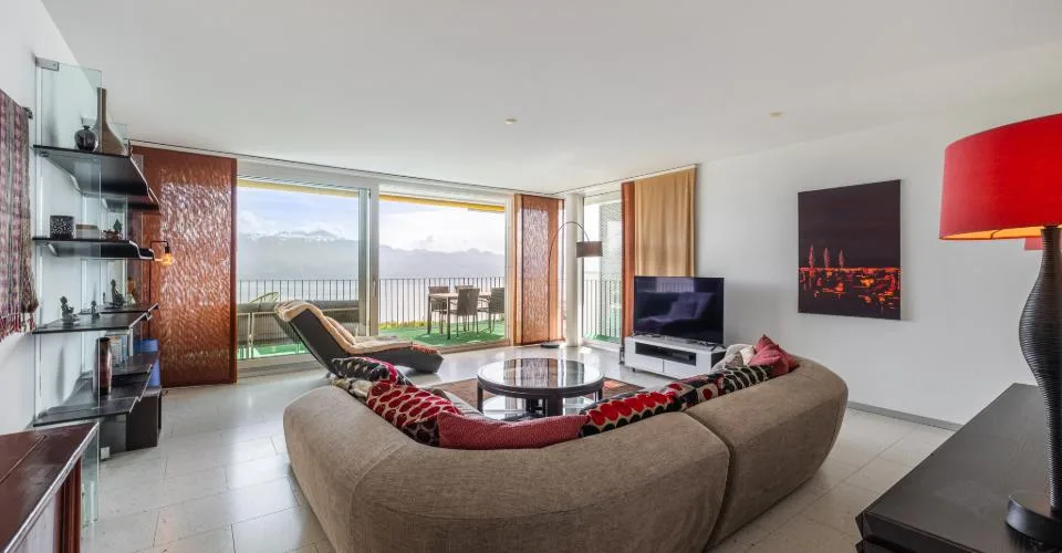 4.5 pièces avec vue lac panoramique, balcon 25 m² & 2 places couvertes