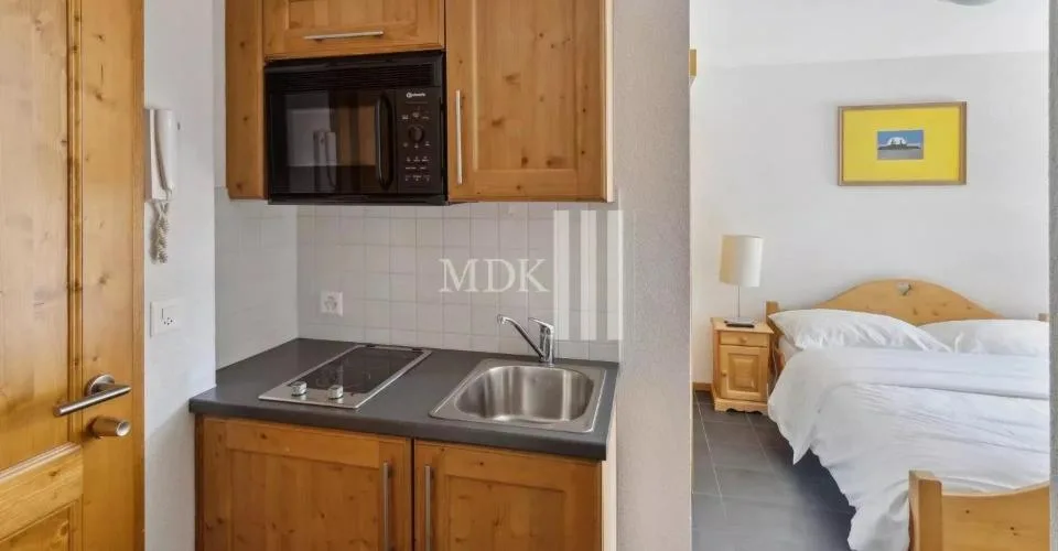Appartement de 2.5 pièces + Studio à vendre aux Thermes-Parc des bains de Val-d'Illiez