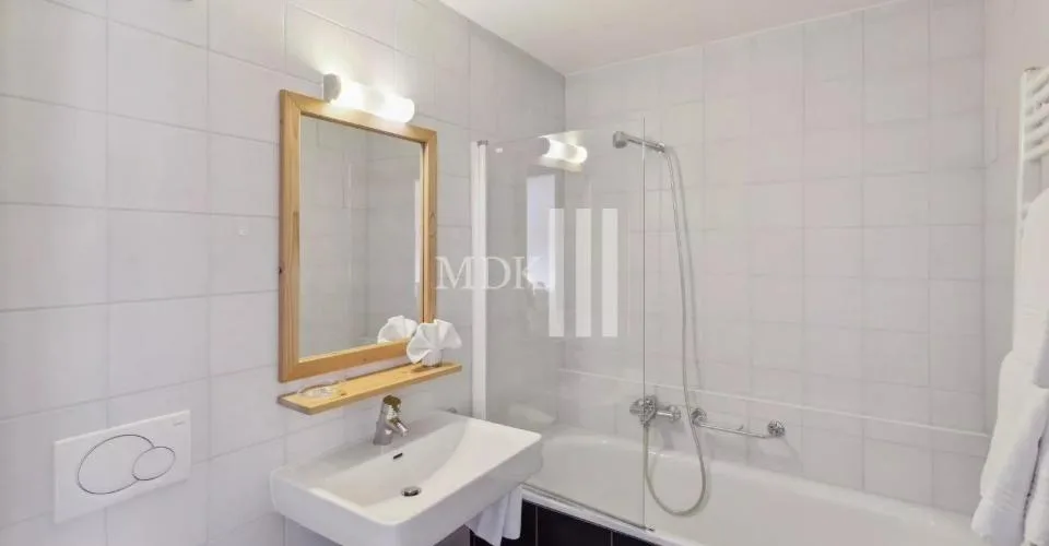 Appartement de 2.5 pièces + Studio à vendre aux Thermes-Parc des bains de Val-d'Illiez