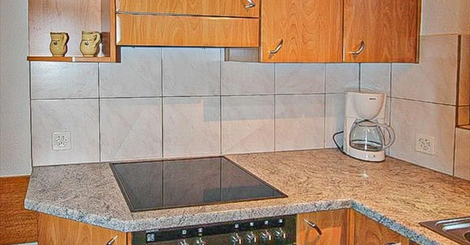 Appartement 3.5-17, appartement cozy de 3.5 pièces au centre avec 2 pièces supplémentaires dans les combles, balcon et une super vue