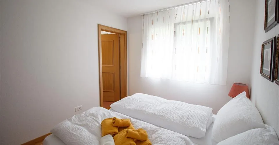 Résidence 5.5-02, Appartement luxueux et élégant de 5.5 pièces avec cheminée et belle vue panoramique sur les montagnes