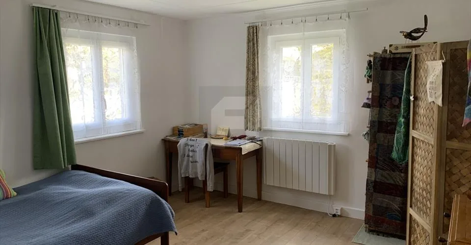 A vendre - Immeuble 2 appartements + grange + garage