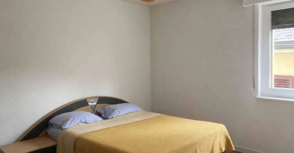 Spacieux 4.5 pièces avec balcon, cave et garage - idéal investisseur !