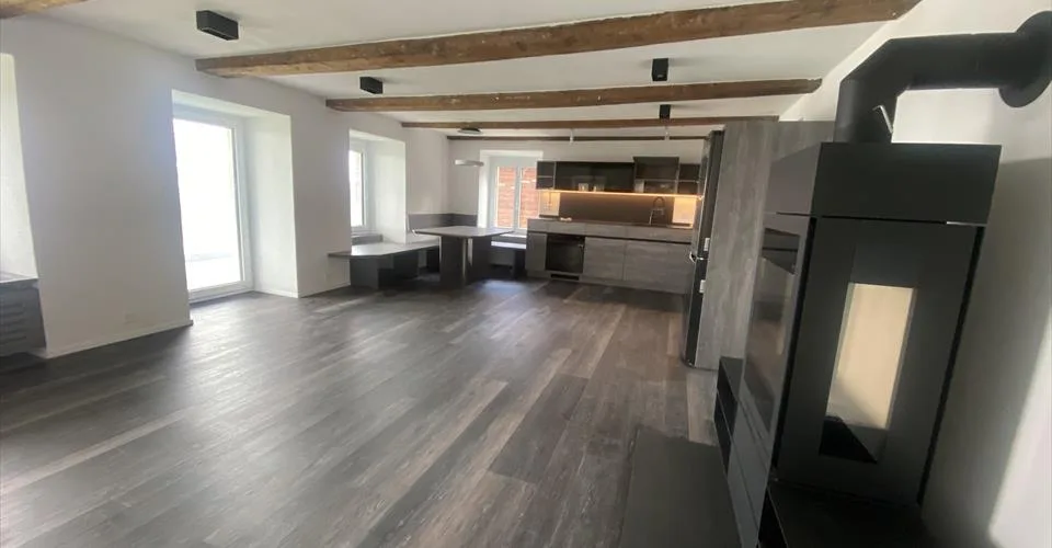 Immeuble à EISCHOLL, appartement 2 pièces rénové au centre, avec un grand balcon et cheminée